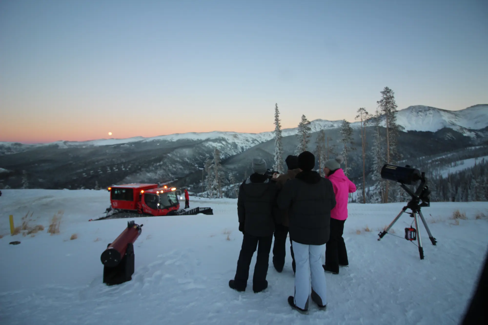 A winter astronomy program overlooking the mountains at Winter Park Resort